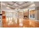 Large Gathering room with hardwood floors, stone fireplace and high ceilings at 745 Glengate Pl, Atlanta, GA 30328