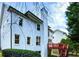 White brick house with a red deck and a tall chimney at 745 Glengate Pl, Atlanta, GA 30328