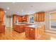 Kitchen with granite countertops and wood cabinets at 745 Glengate Pl, Atlanta, GA 30328