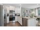 Modern kitchen with stainless steel appliances and granite countertops at 2102 Moss Hill Rd, Stone Mountain, GA 30088