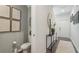 Convenient half-bath with toilet and sink at 2102 Moss Hill Rd, Stone Mountain, GA 30088