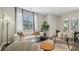 Spacious living room with large windows at 2104 Moss Hill Rd, Stone Mountain, GA 30088