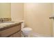 Small bathroom with granite vanity and toilet at 272 Mckenzie Dr, Stockbridge, GA 30281