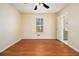 Bedroom with wood-look flooring and ceiling fan at 272 Mckenzie Dr, Stockbridge, GA 30281