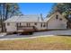 Back of house showing deck and yard, some snow on the ground at 272 Mckenzie Dr, Stockbridge, GA 30281