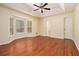Main bedroom with hardwood floors, bay window and ceiling fan at 272 Mckenzie Dr, Stockbridge, GA 30281