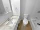 Clean bathroom with updated vanity and tile flooring at 1612 Alexandria Se Ct, Marietta, GA 30067