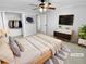Virtually staged bedroom with a large closet and hardwood floors at 1612 Alexandria Se Ct, Marietta, GA 30067