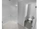 Upstairs hallway with carpet and access to bathroom at 1612 Alexandria Se Ct, Marietta, GA 30067