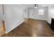 Bright living room with hardwood floors and a fireplace at 1612 Alexandria Se Ct, Marietta, GA 30067