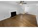 Living room with hardwood floors and a cozy fireplace at 1612 Alexandria Se Ct, Marietta, GA 30067