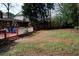 Large backyard with spacious deck and mature trees at 2499 Little John Se Trl, Marietta, GA 30067