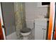 Bathroom with tub, toilet and vanity at 2499 Little John Se Trl, Marietta, GA 30067