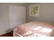 Bedroom with hardwood floors and a queen bed at 2499 Little John Se Trl, Marietta, GA 30067