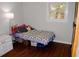 bedroom with hardwood floors and a twin bed at 2499 Little John Se Trl, Marietta, GA 30067