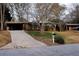 Brick ranch home with long driveway and mailbox at 2499 Little John Se Trl, Marietta, GA 30067