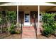 Brick steps leading to the front door, flanked by greenery at 2499 Little John Se Trl, Marietta, GA 30067