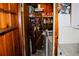 Laundry area includes shelving and a stackable washer/dryer at 2499 Little John Se Trl, Marietta, GA 30067