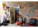 Exterior workshop with brick walls and ample storage shelving at 2499 Little John Se Trl, Marietta, GA 30067
