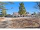 One-story house with a long driveway and carport at 5024 Klondike Rd, Lithonia, GA 30038