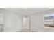 Upstairs bedroom with window and access to another room at 42 Parkview Dr, Dallas, GA 30157