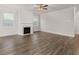 Spacious living room featuring hardwood floors and a fireplace at 42 Parkview Dr, Dallas, GA 30157