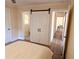 Main bedroom with double doors to en-suite bathroom and hallway at 1912 Canmont Ne Dr, Atlanta, GA 30319
