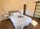 Spacious bedroom with wood floors, large windows, and a ceiling fan at 1912 Canmont Ne Dr, Atlanta, GA 30319