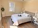 Spacious bedroom with wood floors, large windows, and a ceiling fan at 1912 Canmont Ne Dr, Atlanta, GA 30319
