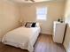 Bedroom with a full bed, dresser, and a window at 1912 Canmont Ne Dr, Atlanta, GA 30319