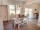 Bright dining room with hardwood floors and a view to the backyard at 1912 Canmont Ne Dr, Atlanta, GA 30319