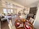 Open concept dining room with hardwood floors and a round wooden table at 1912 Canmont Ne Dr, Atlanta, GA 30319