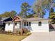 Newly constructed home with light-blue siding and modern design elements at 1912 Canmont Ne Dr, Atlanta, GA 30319
