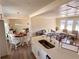 Open concept kitchen and dining area with white cabinets and stainless steel appliances at 1912 Canmont Ne Dr, Atlanta, GA 30319