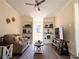 Bright living room with hardwood floors, built-in shelving, and comfortable seating at 1912 Canmont Ne Dr, Atlanta, GA 30319