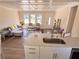 Bright living room features hardwood floors, comfy seating, and an open floor plan at 1912 Canmont Ne Dr, Atlanta, GA 30319