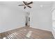 Bright bedroom with hardwood floors and ceiling fan at 1156 Tucker Sw Pl, Atlanta, GA 30310