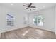 Spacious bedroom with hardwood floors and ceiling fan at 1156 Tucker Sw Pl, Atlanta, GA 30310