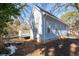Side view of a light blue house with a deck at 1156 Tucker Sw Pl, Atlanta, GA 30310