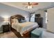 Large main bedroom with a king-size bed, plenty of natural light, and a ceiling fan at 1783 Chasewood Park Ln, Marietta, GA 30066