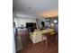Spacious living room with hardwood floors, fireplace, and neutral color palette at 21 Muncy Se Ct, Smyrna, GA 30080