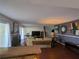 Spacious living room with hardwood floors, fireplace, and neutral color palette at 21 Muncy Se Ct, Smyrna, GA 30080