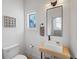 Modern powder room with floating vanity and sleek fixtures at 731 Belt Se Loop, Atlanta, GA 30316