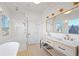 Modern bathroom with double vanity, marble countertops, and walk-in shower at 731 Belt Se Loop, Atlanta, GA 30316