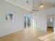 Light-filled bedroom with hardwood floors, large windows, and access to bathroom at 731 Belt Se Loop, Atlanta, GA 30316