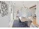 Bright dining room with concrete table and access to living room at 731 Belt Se Loop, Atlanta, GA 30316