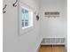Charming entryway with built-in bench, cubbies, and hooks at 731 Belt Se Loop, Atlanta, GA 30316