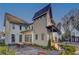 Modern farmhouse design with rear deck and patio at 731 Belt Se Loop, Atlanta, GA 30316