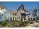 Modern farmhouse exterior with pergola and landscaping at 731 Belt Se Loop, Atlanta, GA 30316