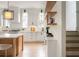 Modern kitchen with white cabinets, light wood island, and stainless steel appliances at 731 Belt Se Loop, Atlanta, GA 30316